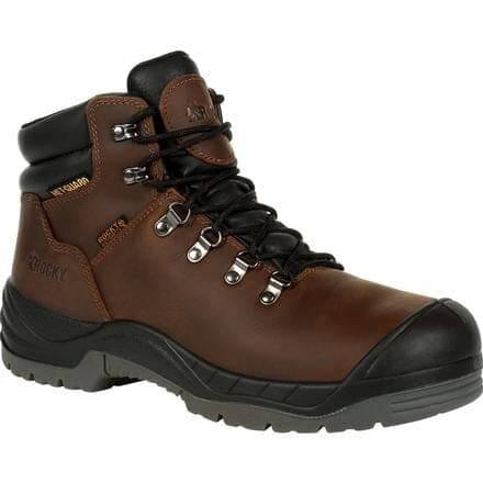 A pair of brown work boots on top of a white ground.